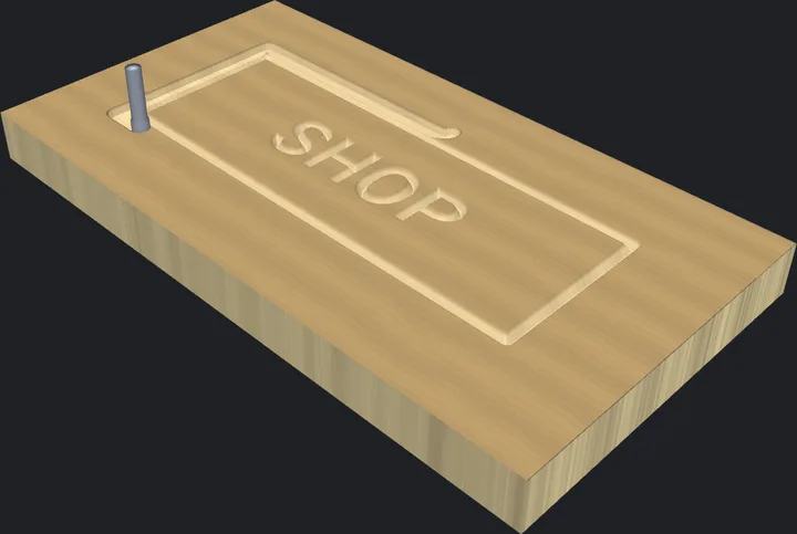 The cut simulation part-way through a v-carve: the lettering and its outline groove are cut, the surrounding pocket is not yet cleared, and the cutter sits on its path